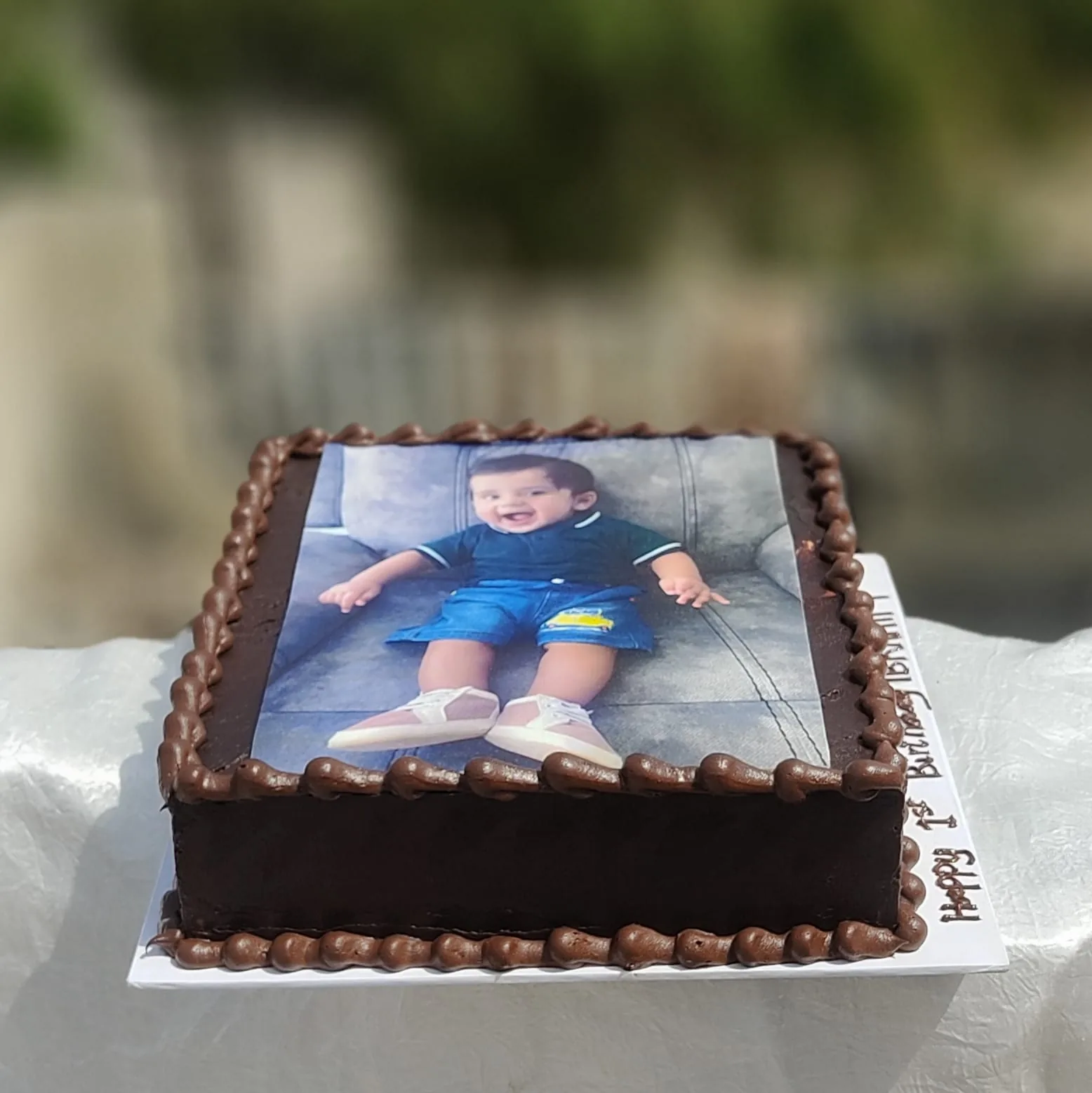 Cake Marque delivery rider with fresh cake in Lahore